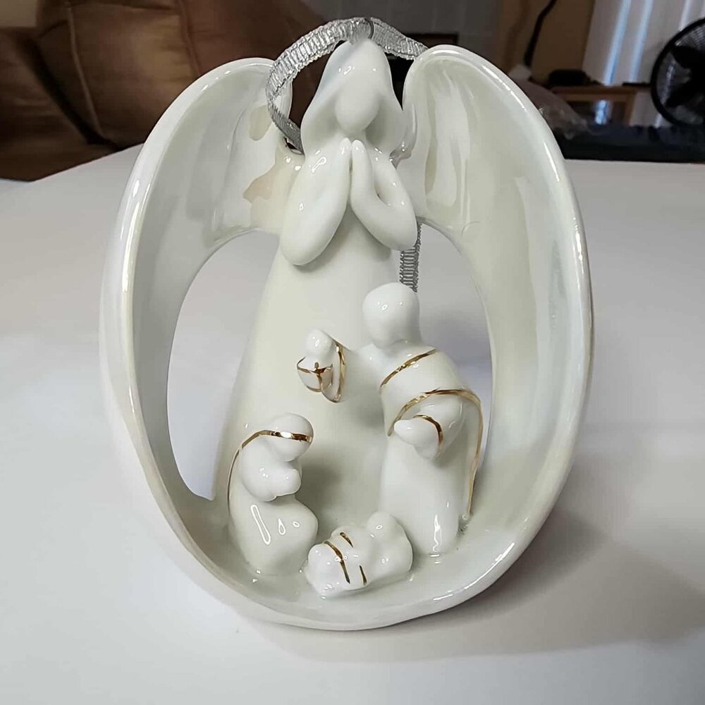 Angel with Nativity Set